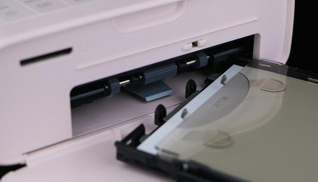 佳能selphycp1200墨盒取不出来,佳能selphycp910使用方法