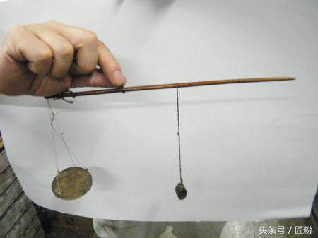 再过几十年，这种长长的秤可能再也看不到了