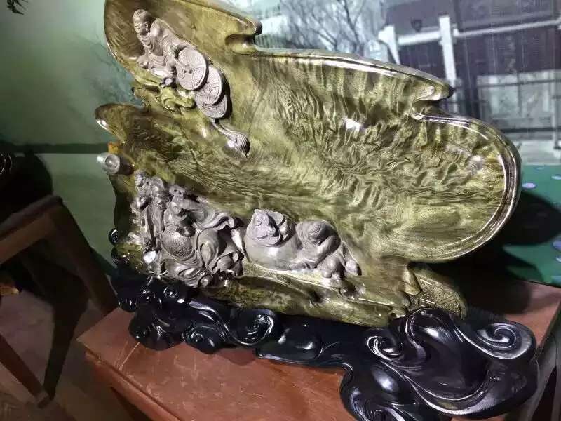 金丝楠乌木财神爷,金丝楠木能摆财神旁边吗