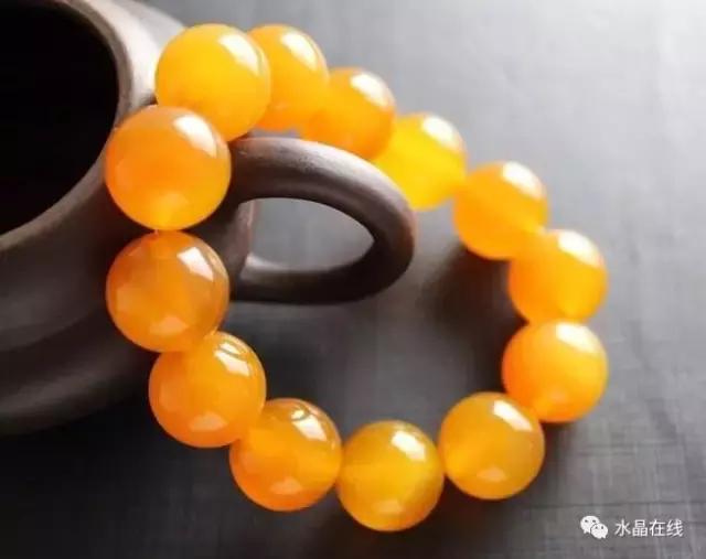 黄水晶千手观音吊坠真假,纯净体黄水晶怎么辨别真假