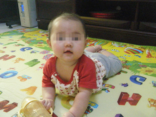 7个月宝宝呕吐不精神35.5度,七个月宝宝呕吐但不哭不闹正常吗