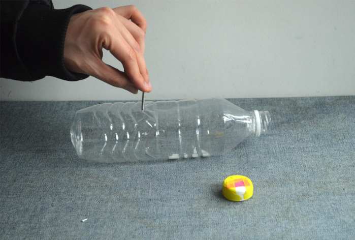 怎么给塑料瓶子底部打洞,塑料瓶改造实用工具