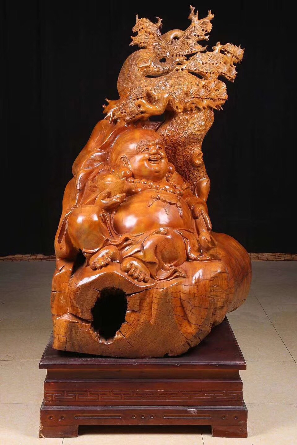 弥勒佛摆放什么位置好,木雕弥勒佛家中摆放有什么讲究