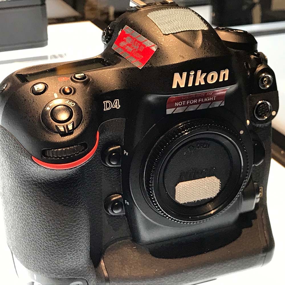 拍照更适合选尼康哪个型号,索尼佳能尼康微单哪个好