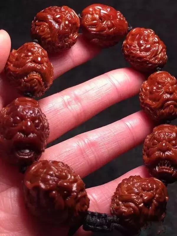 拿到一串橄榄核雕，不用只知道说“卧槽，真好看”了