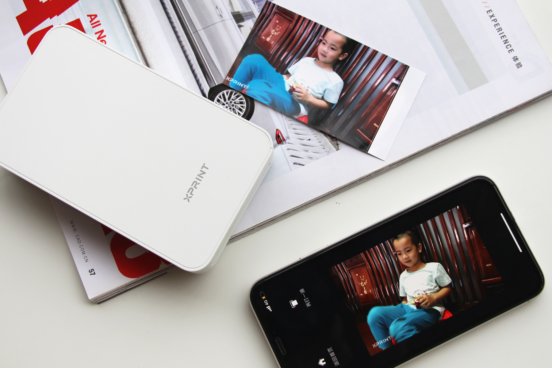 用照片纪念成长难忘时刻，极印手机照片打印机评测