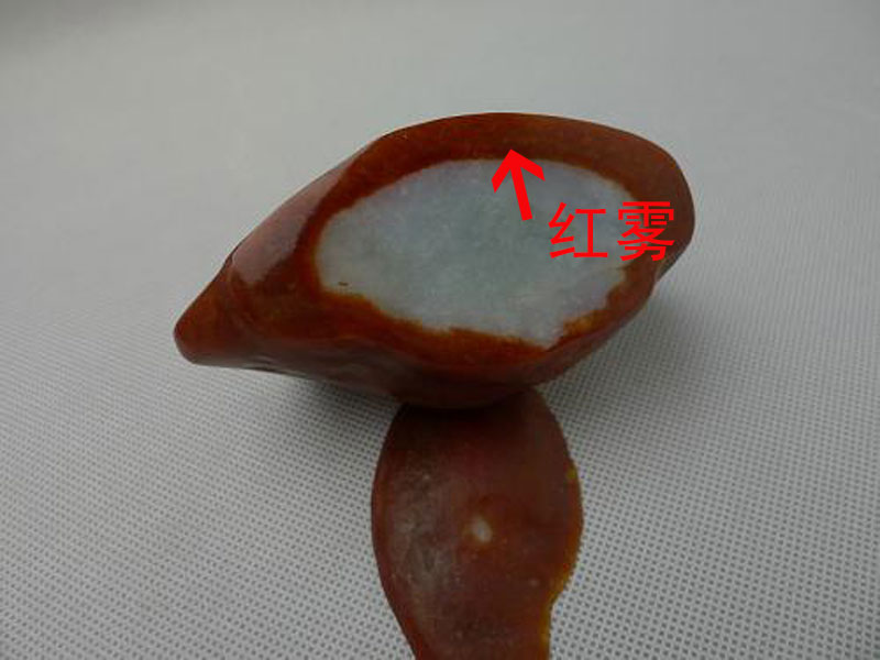 翡翠红雾皮人工制造技术用火烤玉宜无裂,有裂生烤底可见