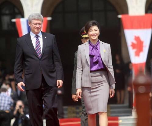 泰国总理英拉惊艳的照片,世界华人女总统