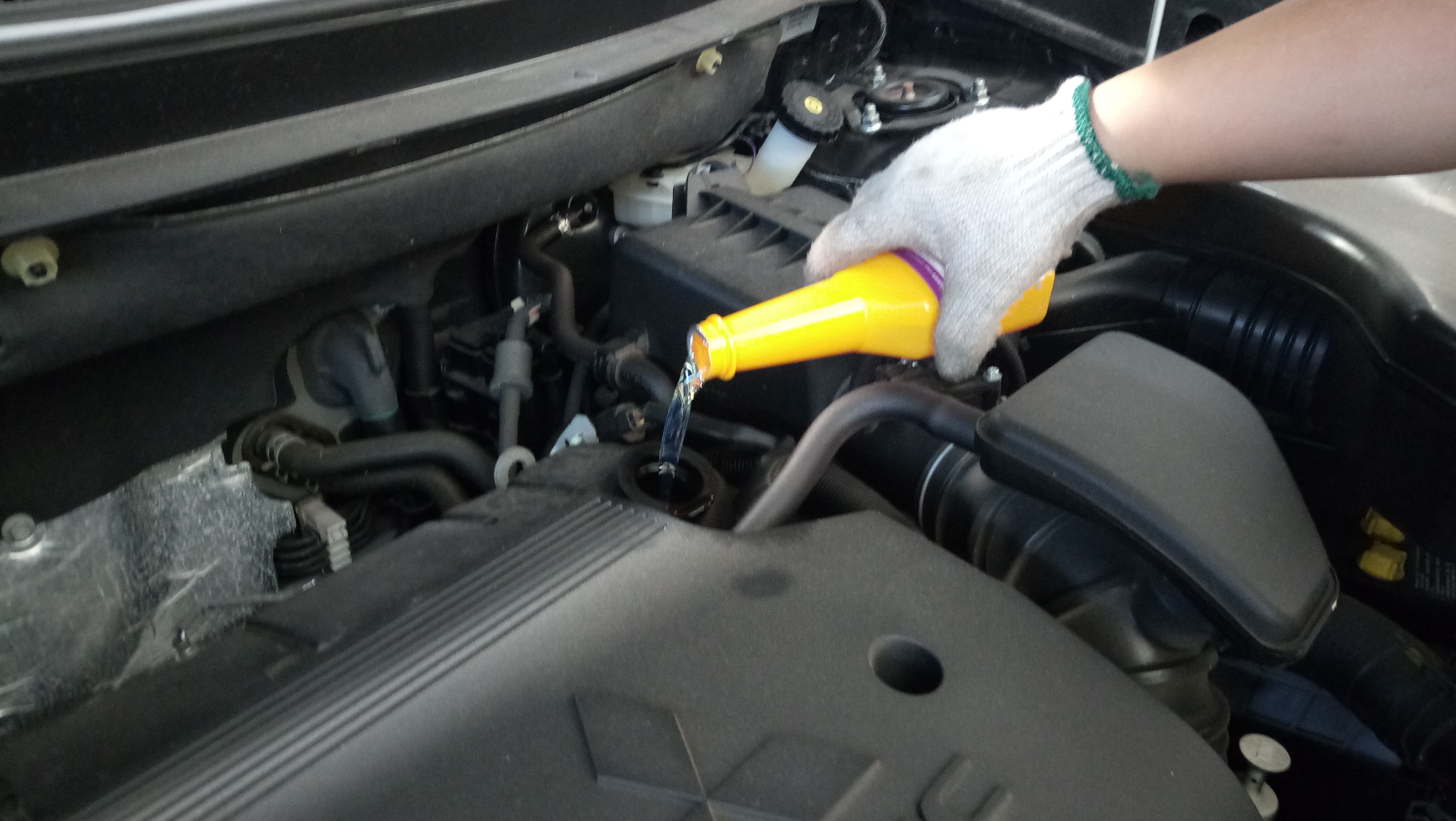 三菱欧蓝德换机油用多少,三菱欧蓝德更换胜牌机油