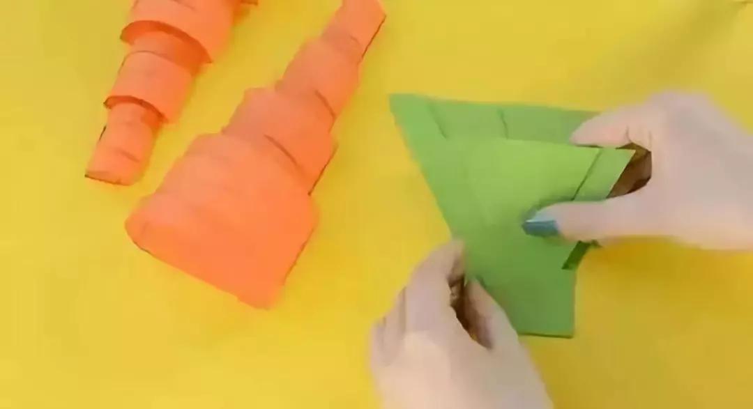 胡萝卜手工作品幼儿园简单教程,手工布艺胡萝卜制作过程图片