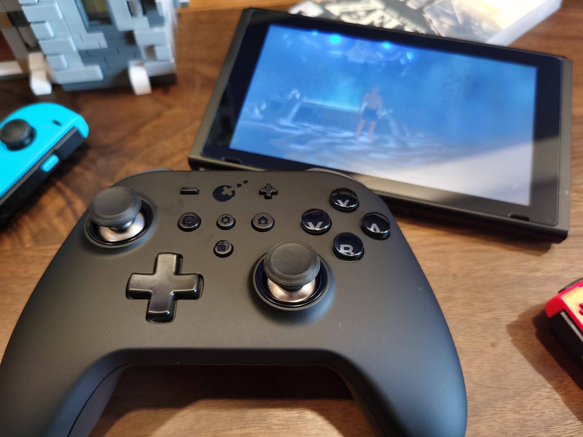 switch手柄对比谷粒金刚手柄,switchpro手柄淘宝200多