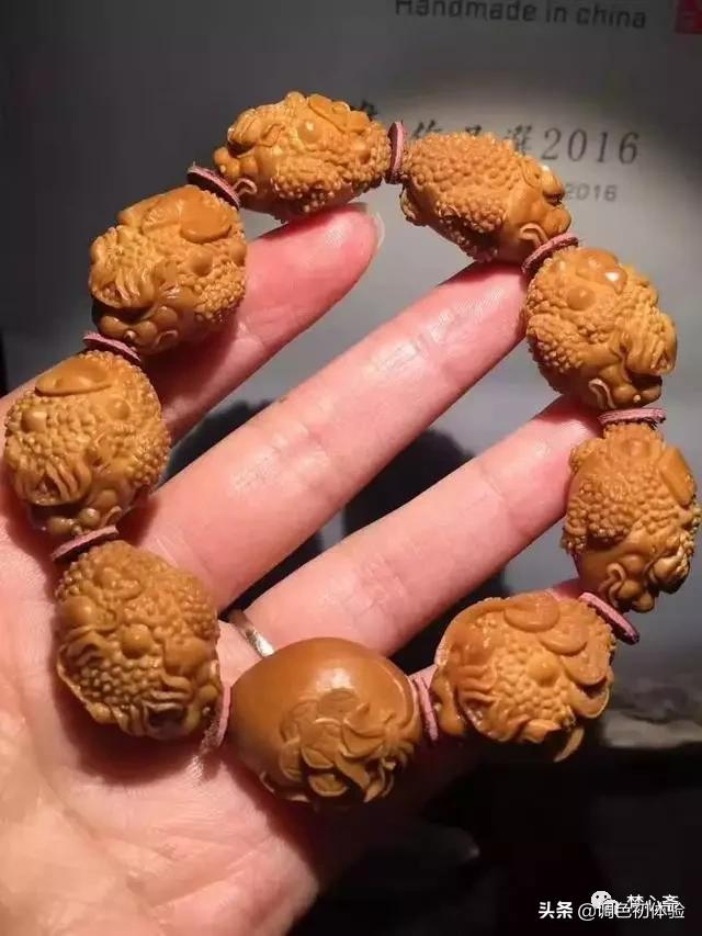 玩橄榄核要有技巧,橄榄核雕什么题材好