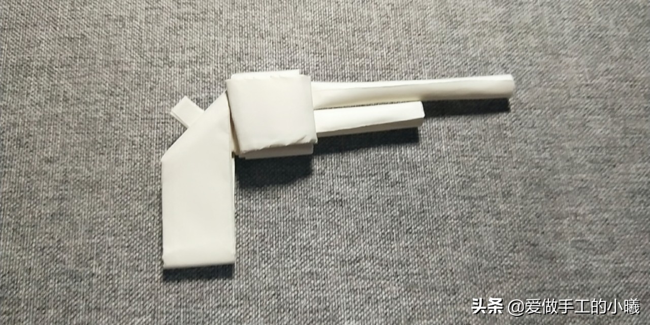 手枪手工折纸长30厘米宽10厘米,童年折纸手枪的子弹怎么做