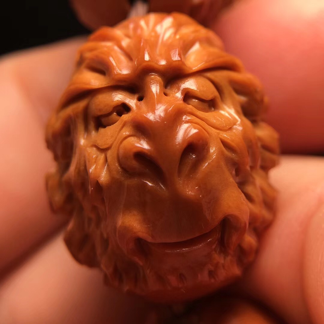 橄榄核十八罗汉手串怎么穿好盘玩,猴头手串和橄榄核手串哪个好盘