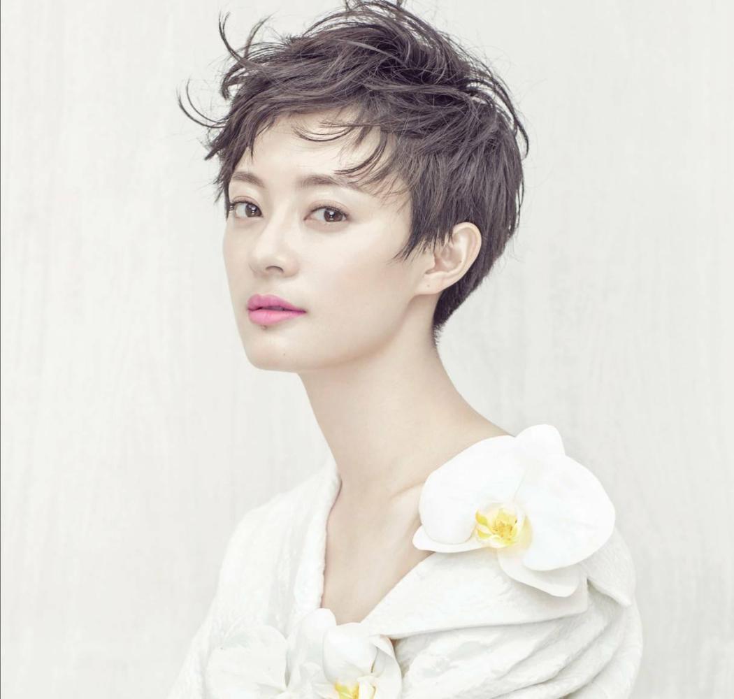 孙俪最新发型半丸子头,孙俪发型烫发小卷图片