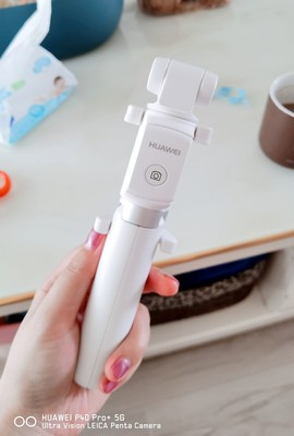 华为有线自拍杆的使用方法及操作,华为手机用自拍杆的使用方法图解