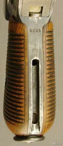 驳壳枪枪托是什么材质,驳壳枪木质套和皮套的区别