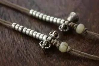 藏式佛珠计数器是怎么用的,佛珠上的计数器怎么挂好看