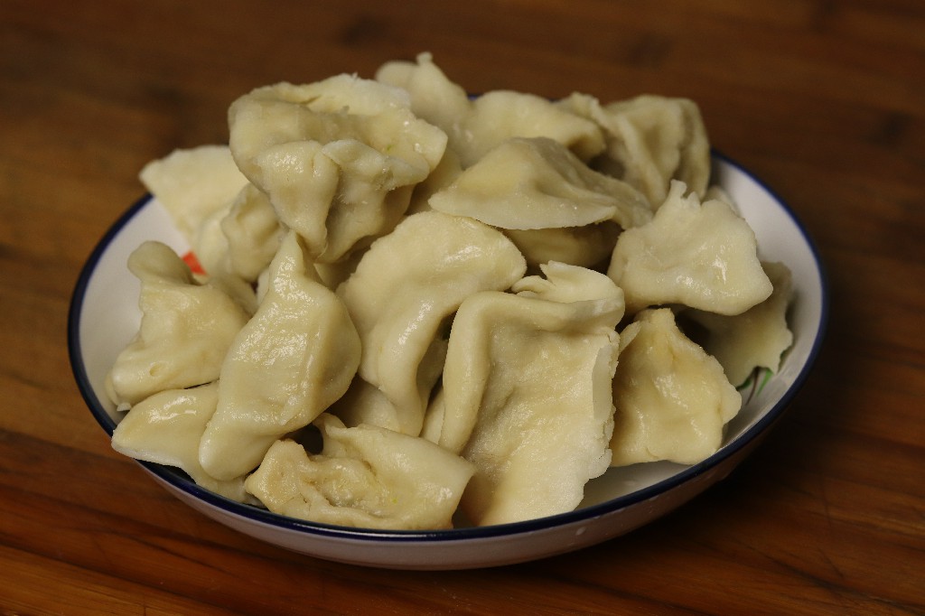 元宵饺子的简单又快包法,元宵节饺子手工制作