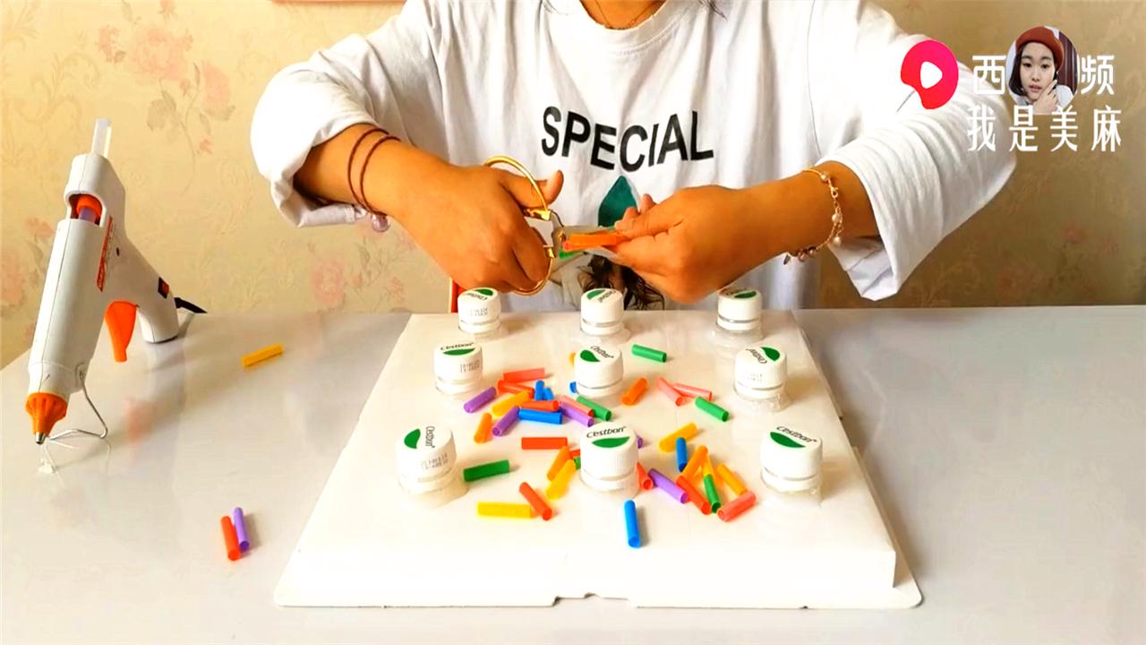 幼儿益智手工玩具制作塑料瓶,废物儿童益智玩具制作