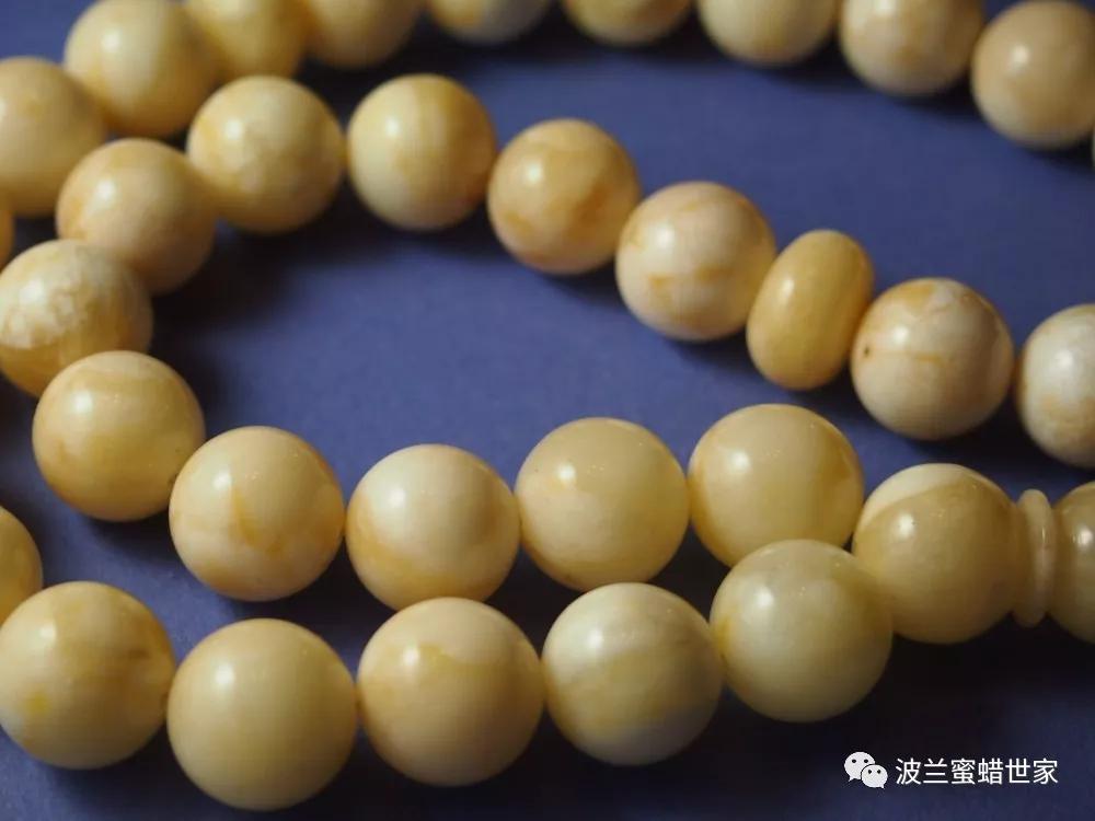 树脂蜜蜡和二代蜜蜡区别,二代蜜蜡是塑料吗