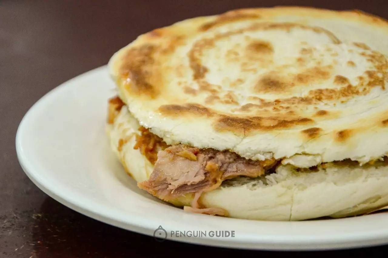 吃西安肉夹馍图片,吃西安肉夹馍视频