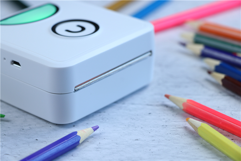 巴掌大小的打印照片的机器,手掌大小的微型口袋书打印