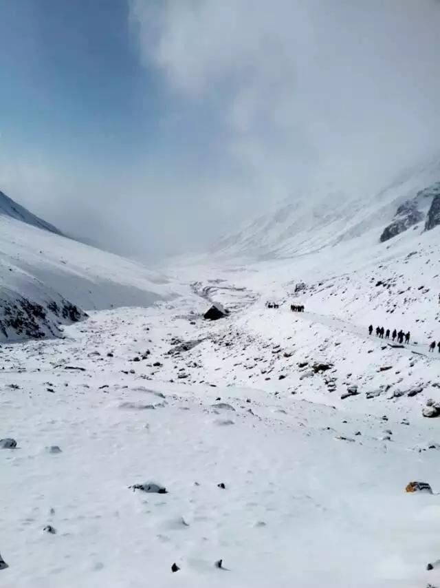 岗什卡雪山海拔多少米,圣洁的雪山辽阔的草原叫什么名字