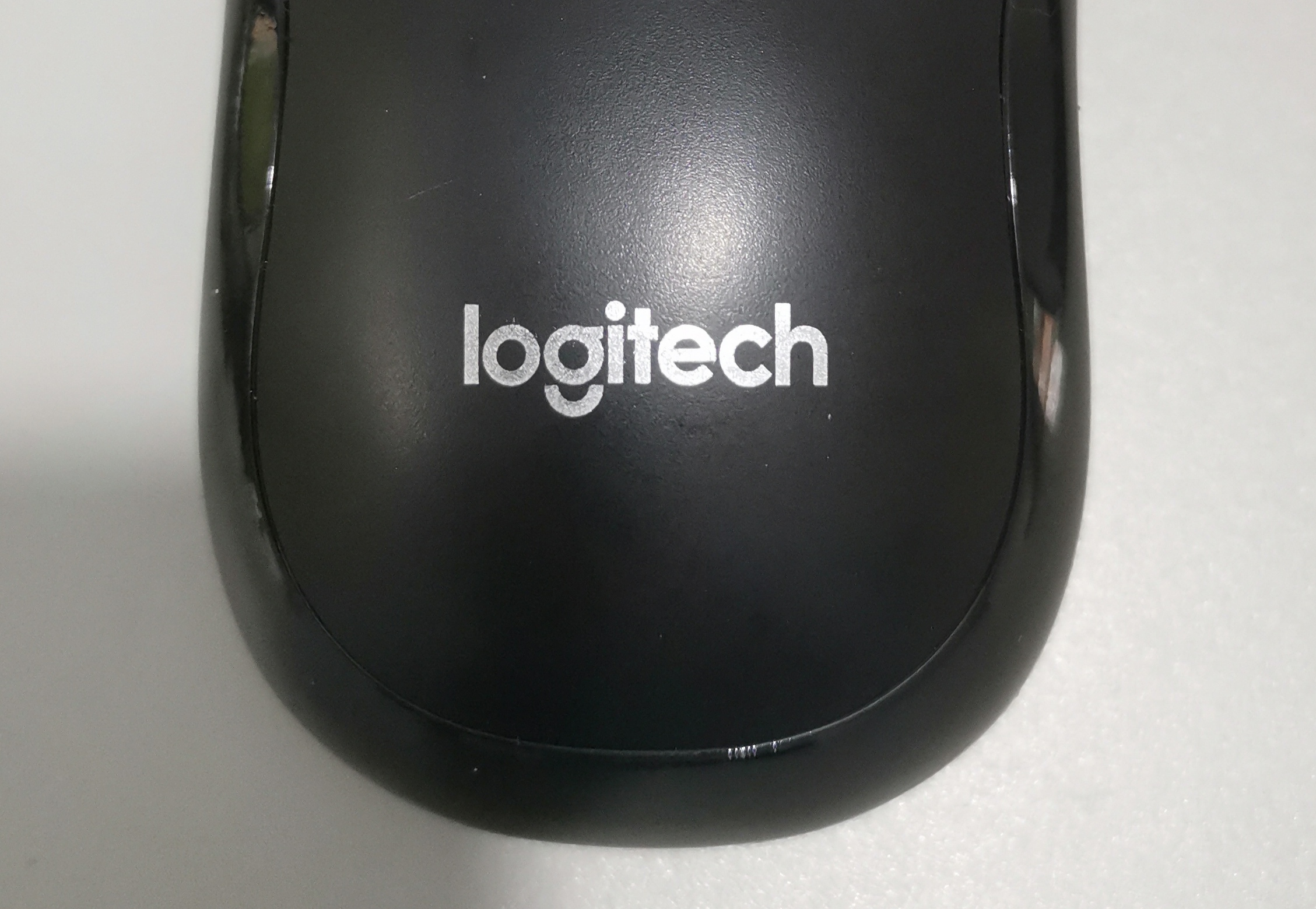 拼多多买罗技m221,拼多多有人卖杂牌机如何举报