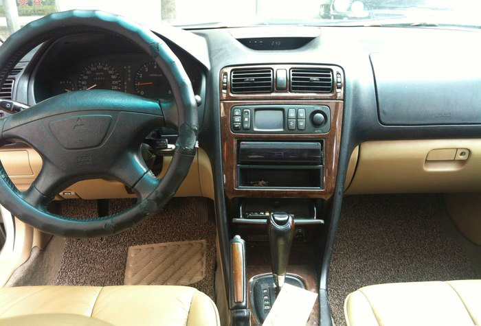 三菱戈蓝老款图片,三菱戈蓝八代鲨鱼头内饰