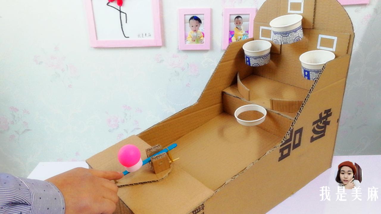 用纸箱给孩子做玩具简单的,爸爸用纸箱给孩子做玩具