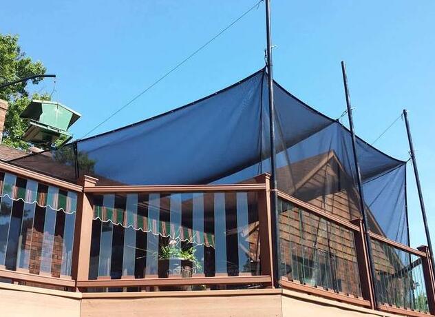 学学外国人露台从不做封闭阳光房，拉一层黑网能隔热，可拆卸
