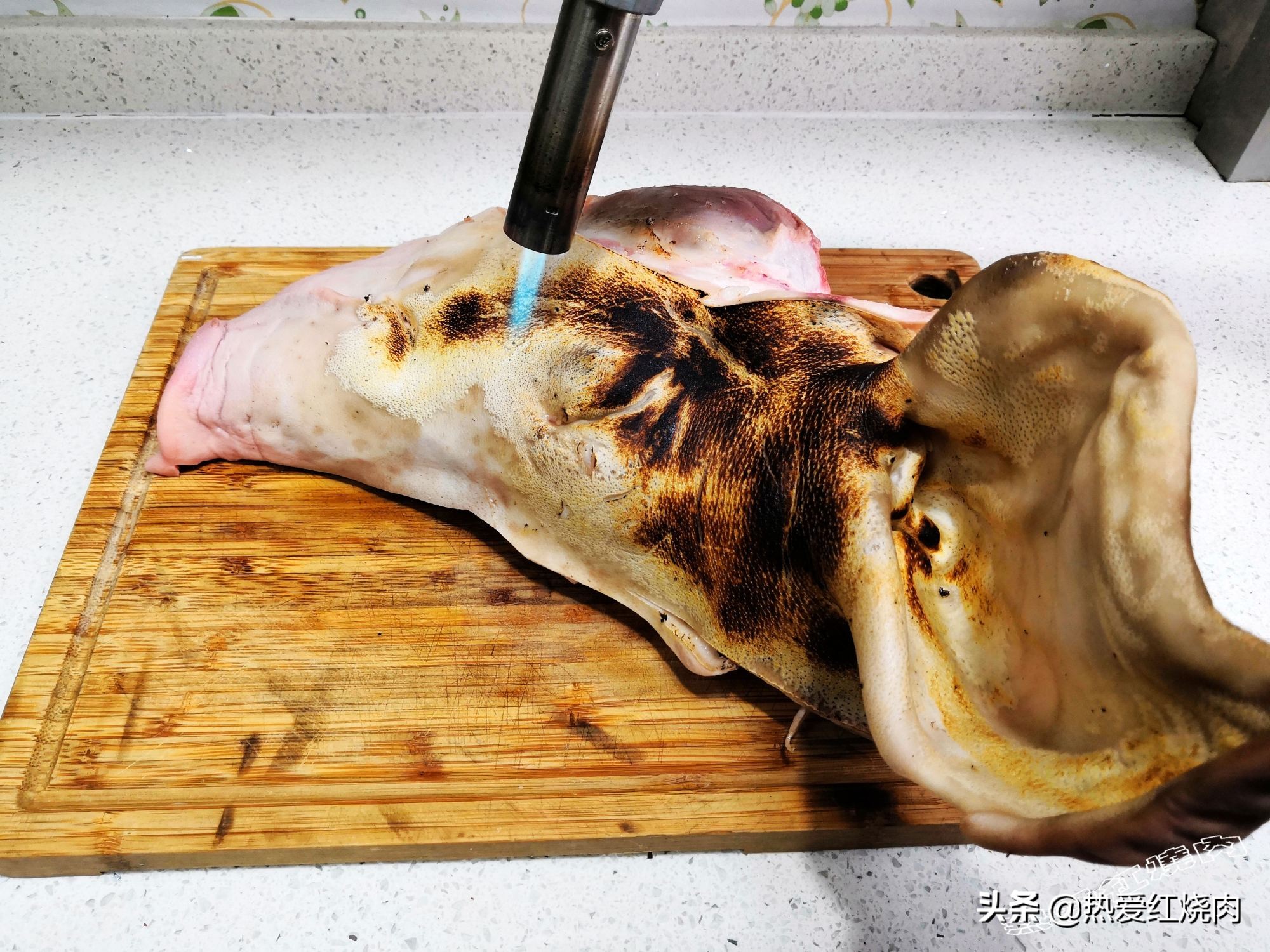 过年买了一个猪头寓意,年夜饭必备的猪头肉