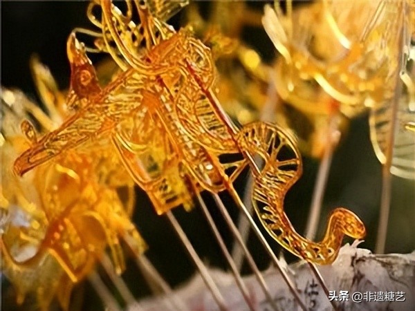 中国传统民间手工艺糖画图片图文,传统手工艺糖画制作作文