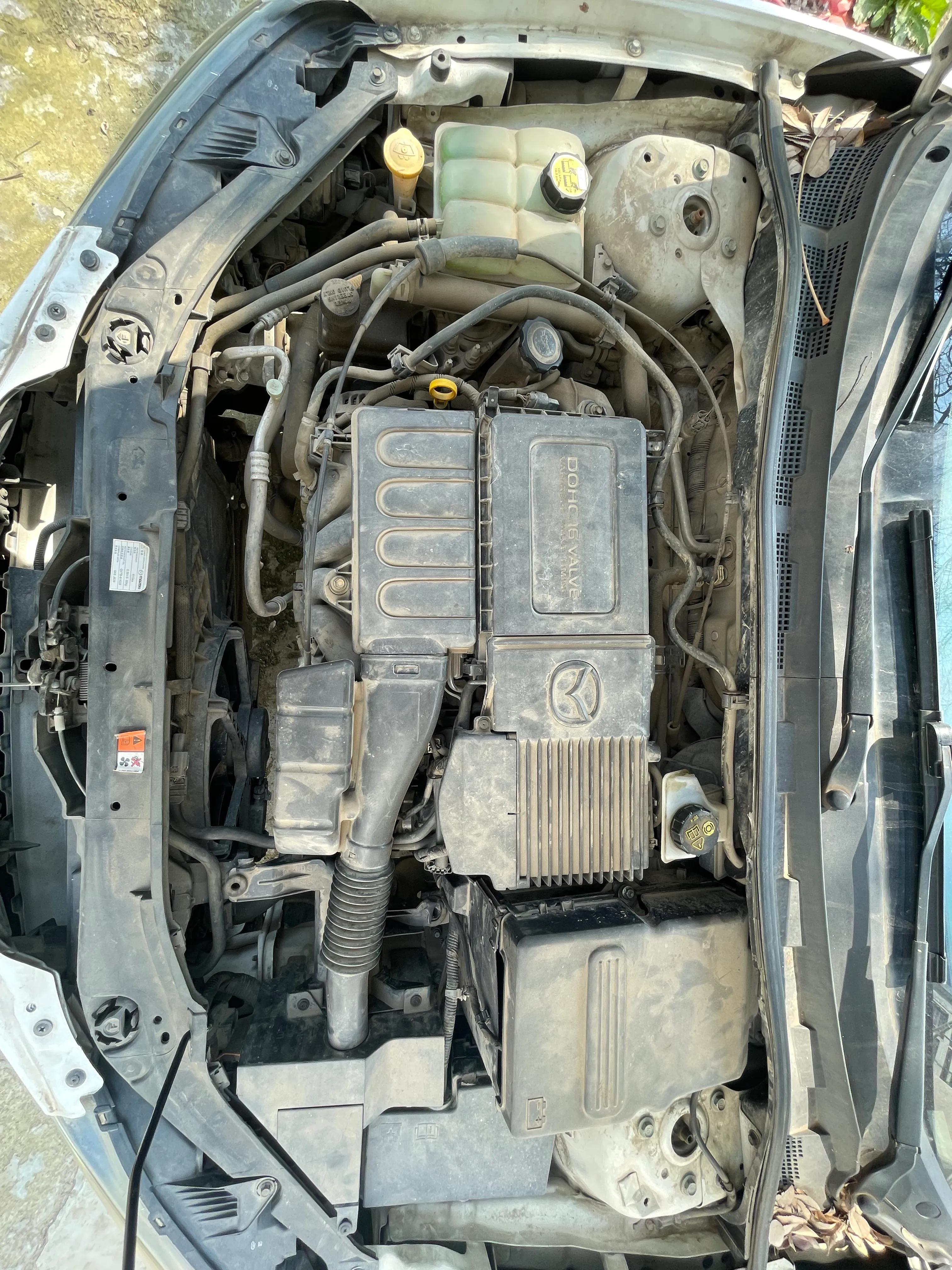 2010款马自达3经典款油耗,经典马自达3近光灯泡更换视频