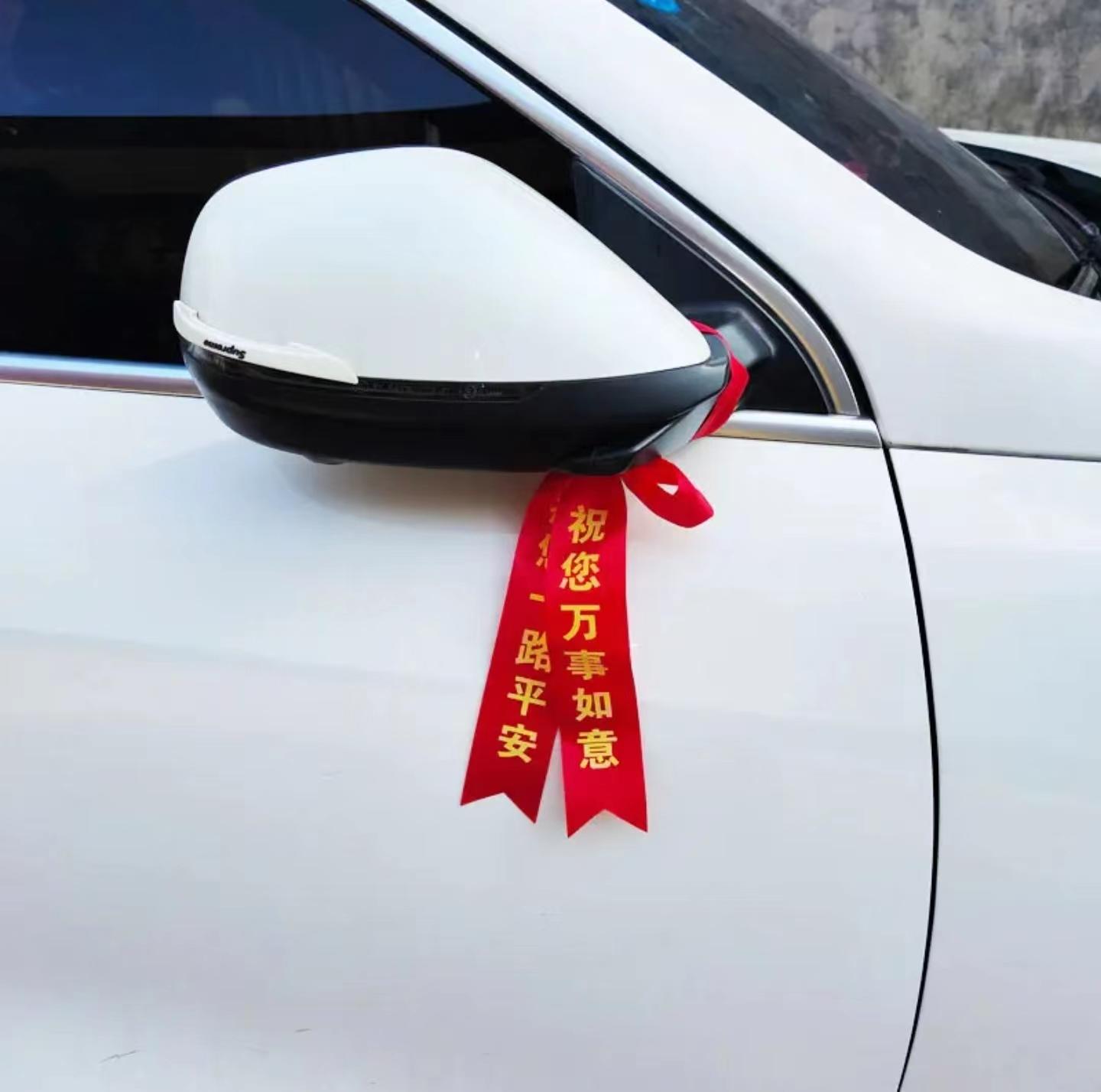 提新车红布怎么用,提新车挂红布挂在哪里