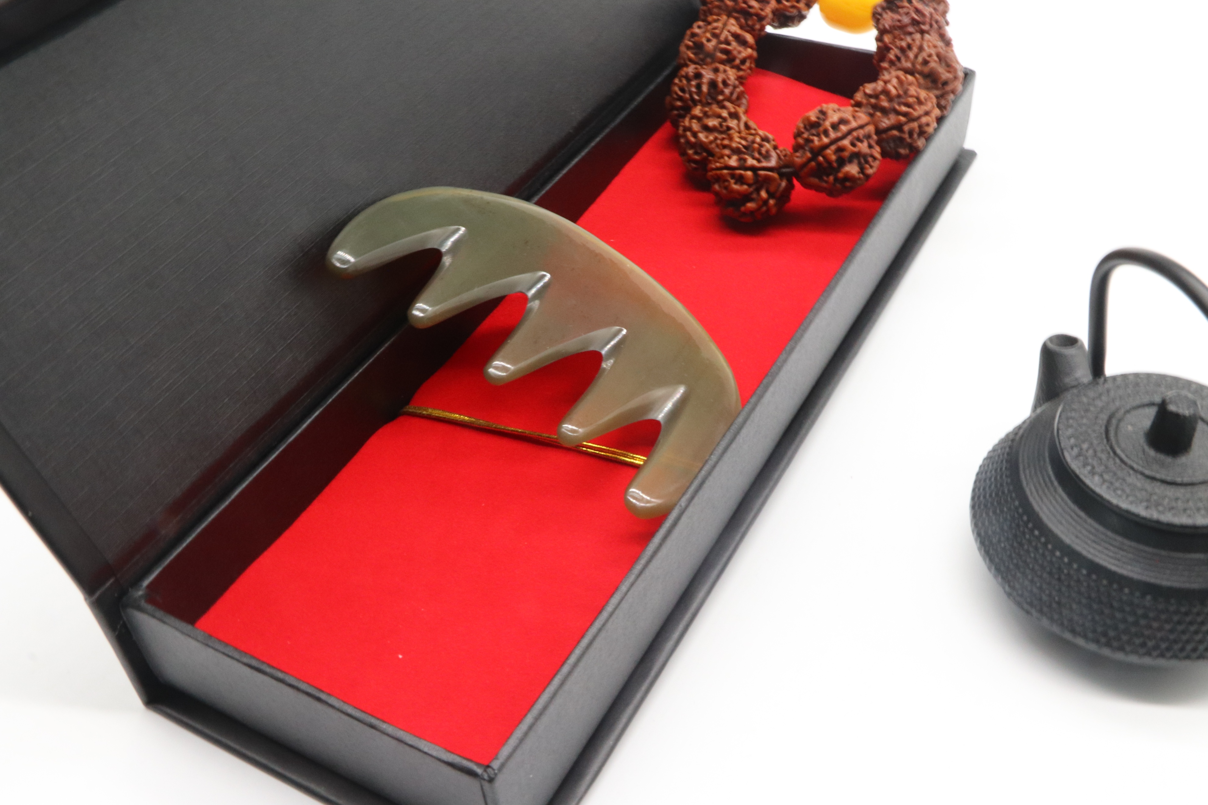 黑色牛角梳辨别真假,牛角梳用几度水试真假