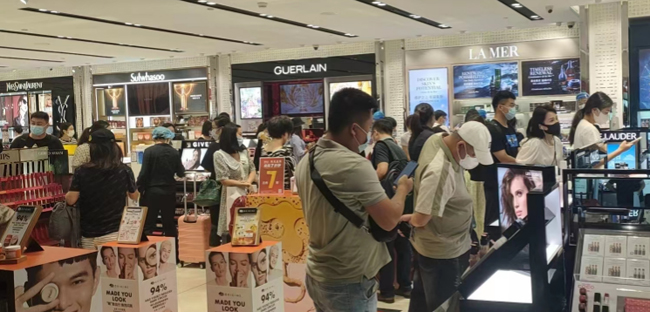 cdf海口美兰机场免税店营业时间,海南海口机场春节客流情况