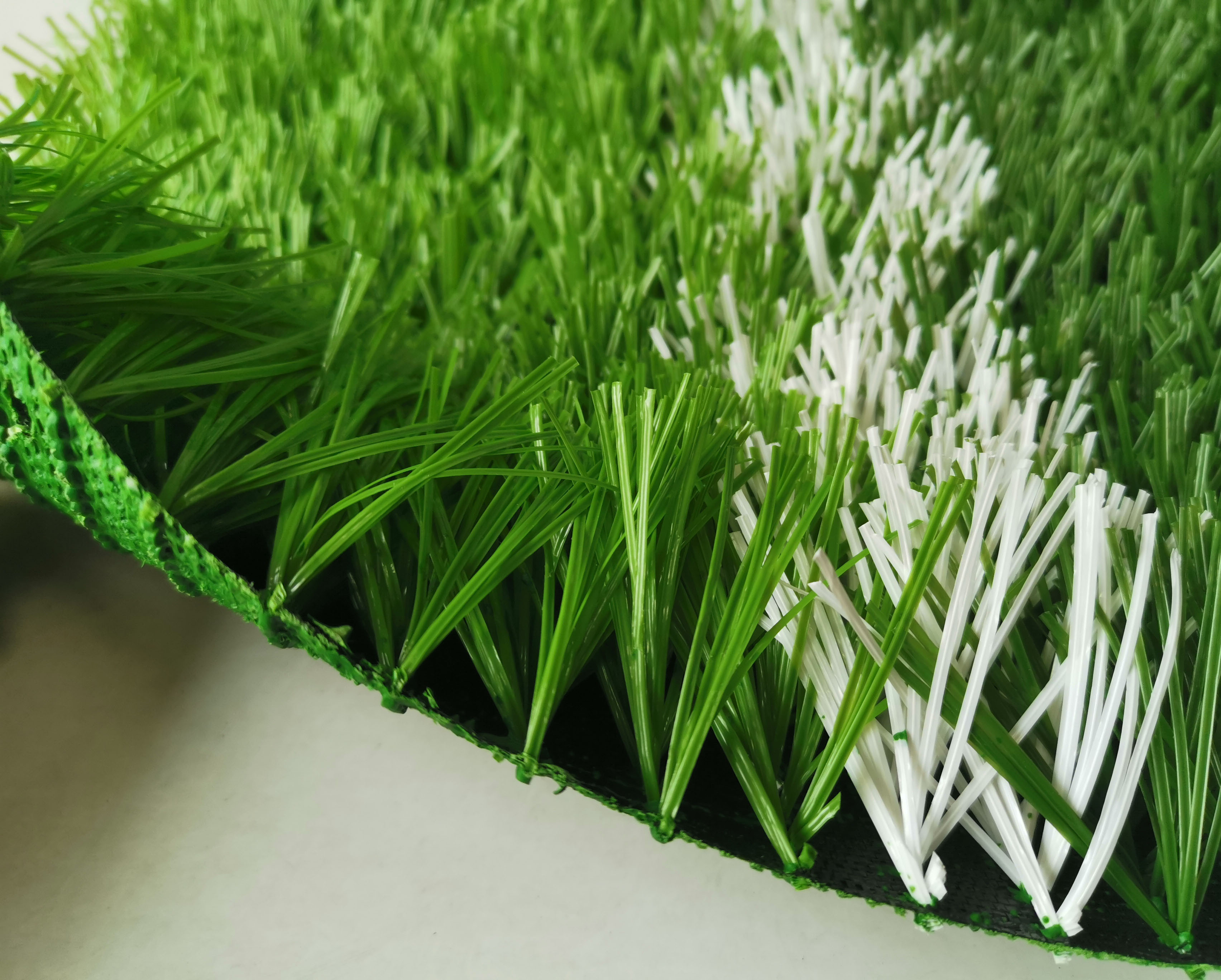 人造草皮厂家批发足球场,人造草坪足球场厂家