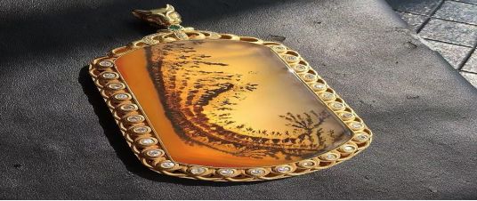 带水草黄龙玉值多少钱,招财黄龙玉