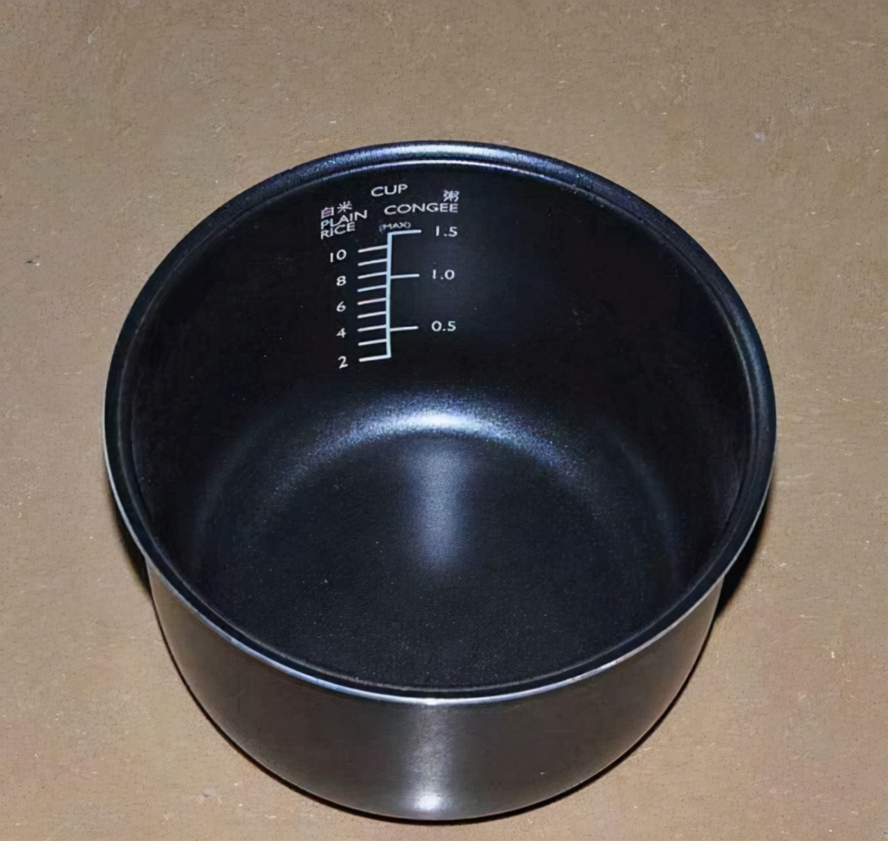 电饭煲内胆涂层掉落后有毒吗,电饭煲内胆涂层掉落有什么危害