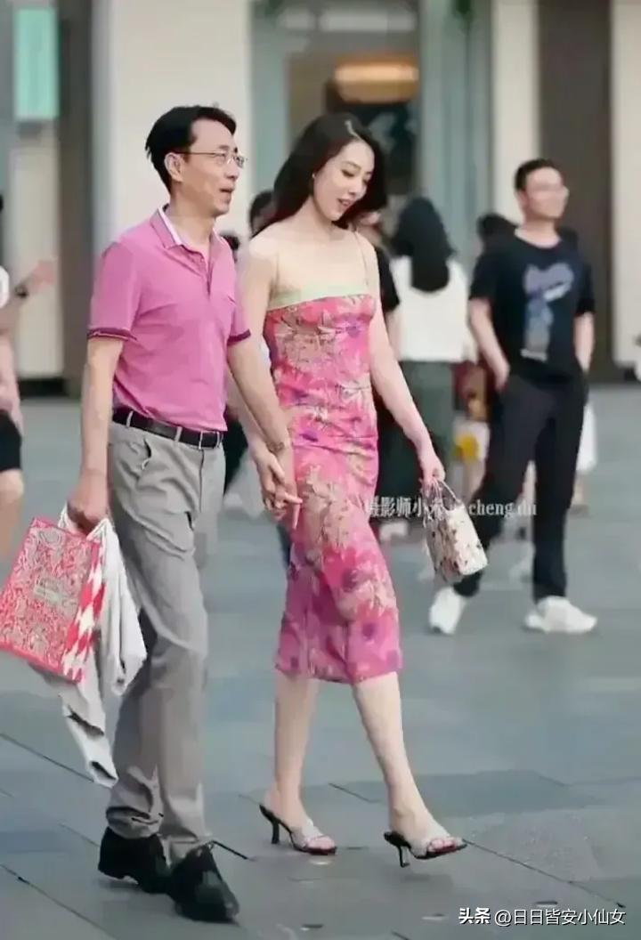 中石油高管情侣装,中石油老总情侣