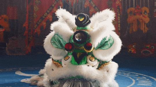 舞狮抢高空绣球比赛,舞狮抢绣球表演