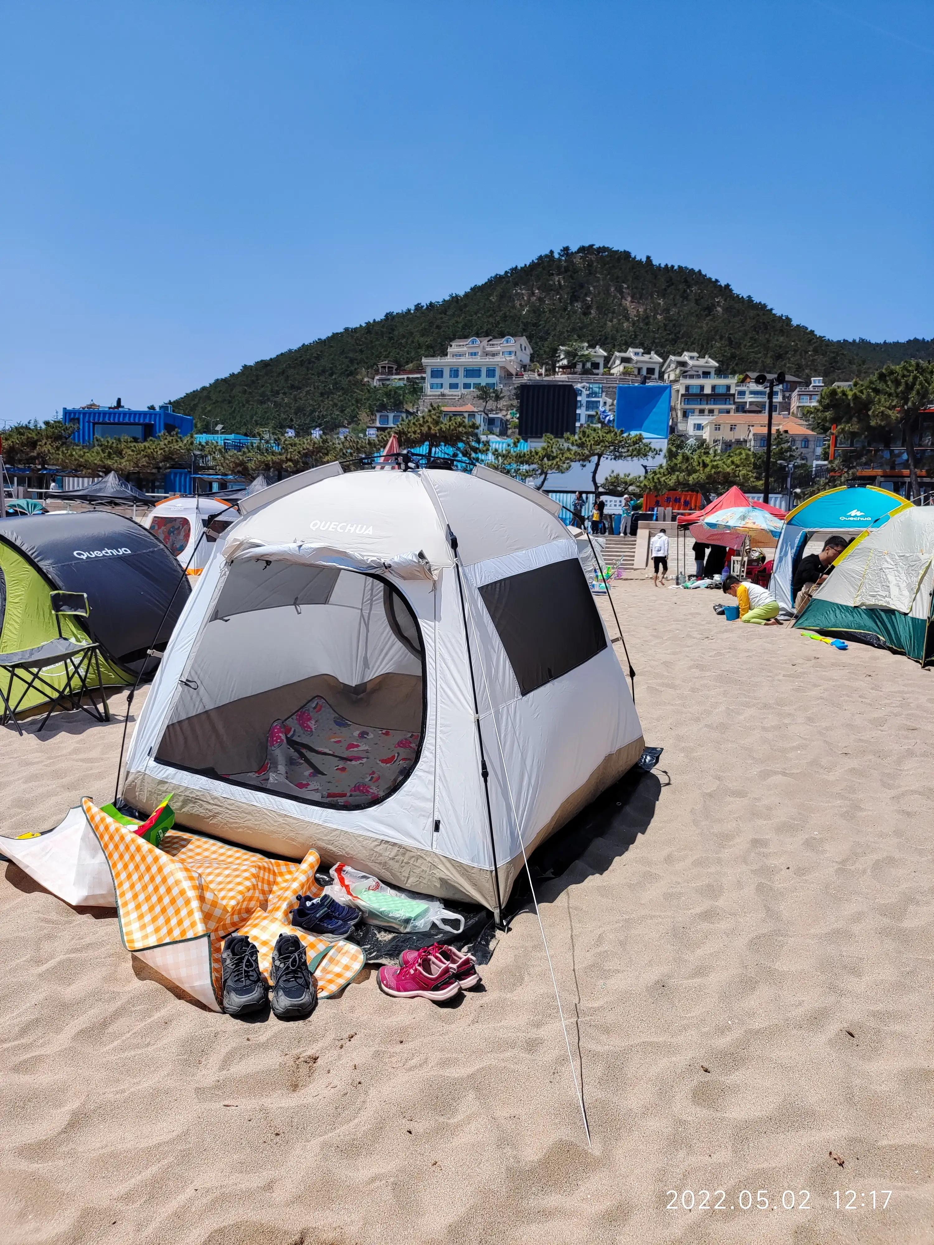 闹市里的风景亦令人赏心悦目,青岛秋千海边沙滩