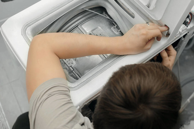 美的洗衣机e50是什么原因,洗衣机故障e50怎么修