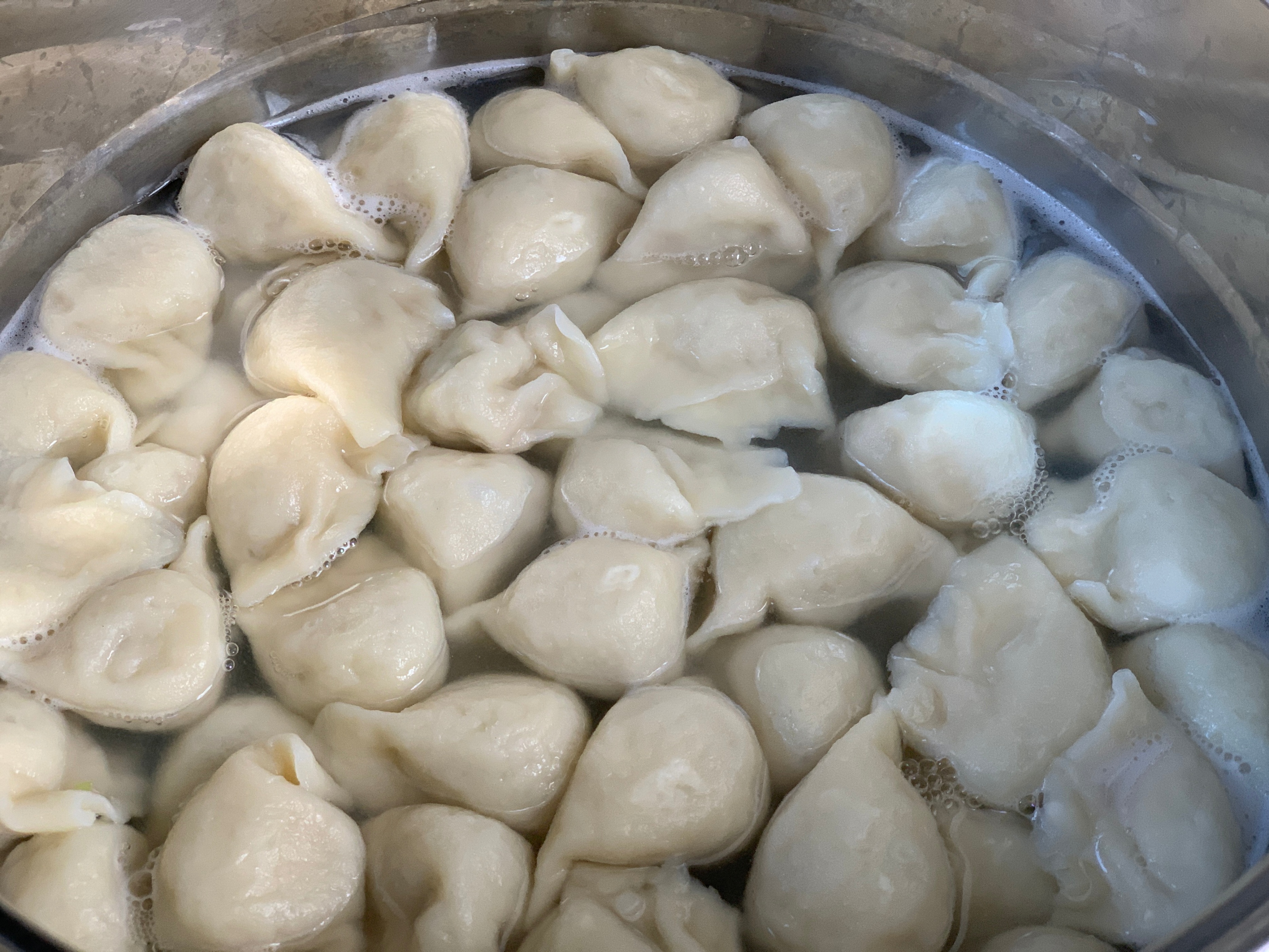 煮饺子不要鼓包,煮饺子千万不要直接捞出