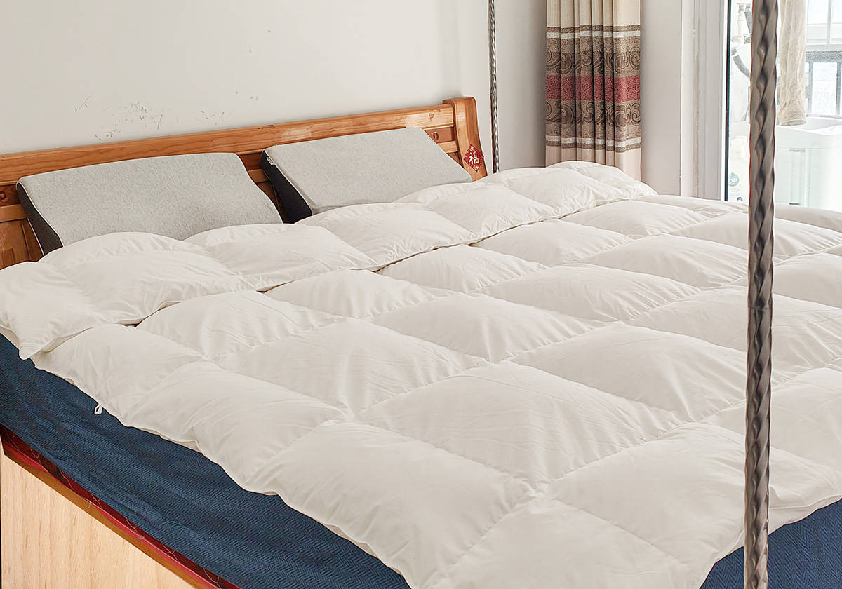 冬天盖鹅绒被暖和吗,夏天睡鹅绒被的体验