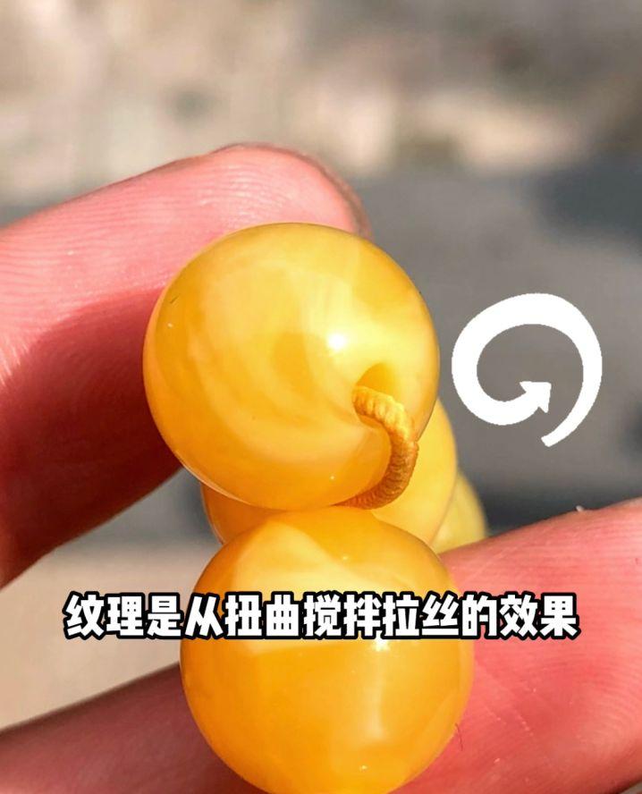 鸡油红蜜蜡鉴别真假方法,蜜蜡打紫光灯一定能鉴别真假吗