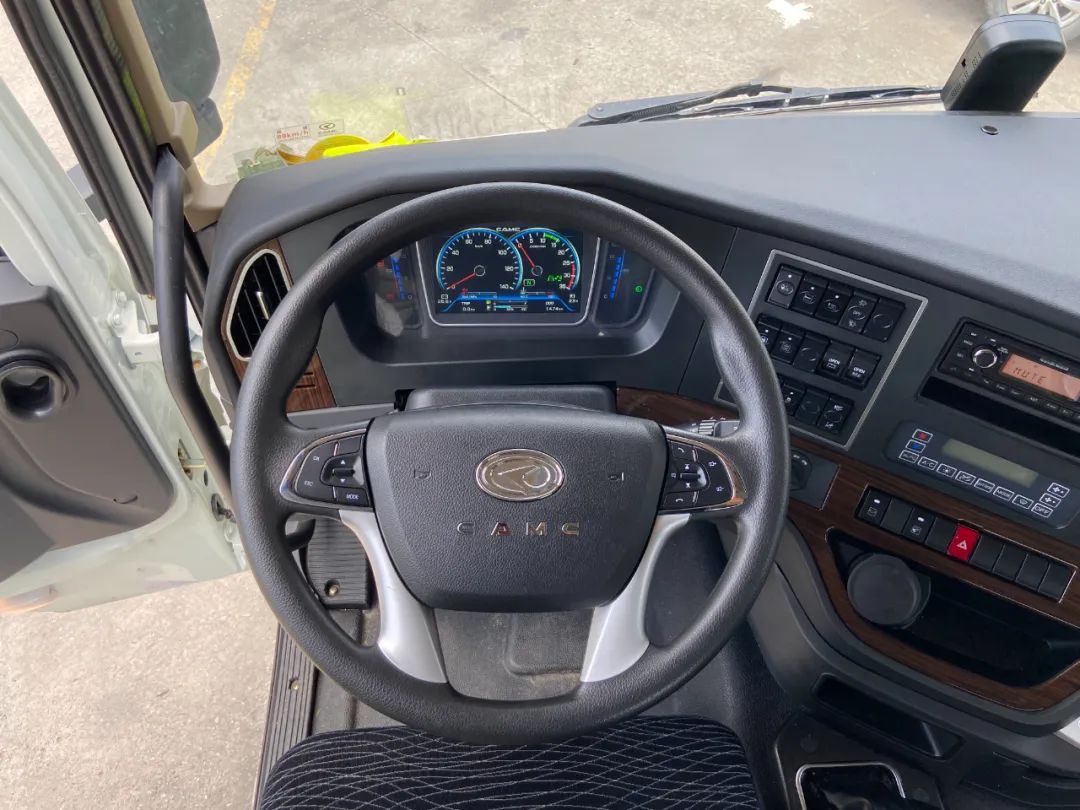 华菱汉马h7460马力牵引车多少钱,拉7吨挖机的自卸车