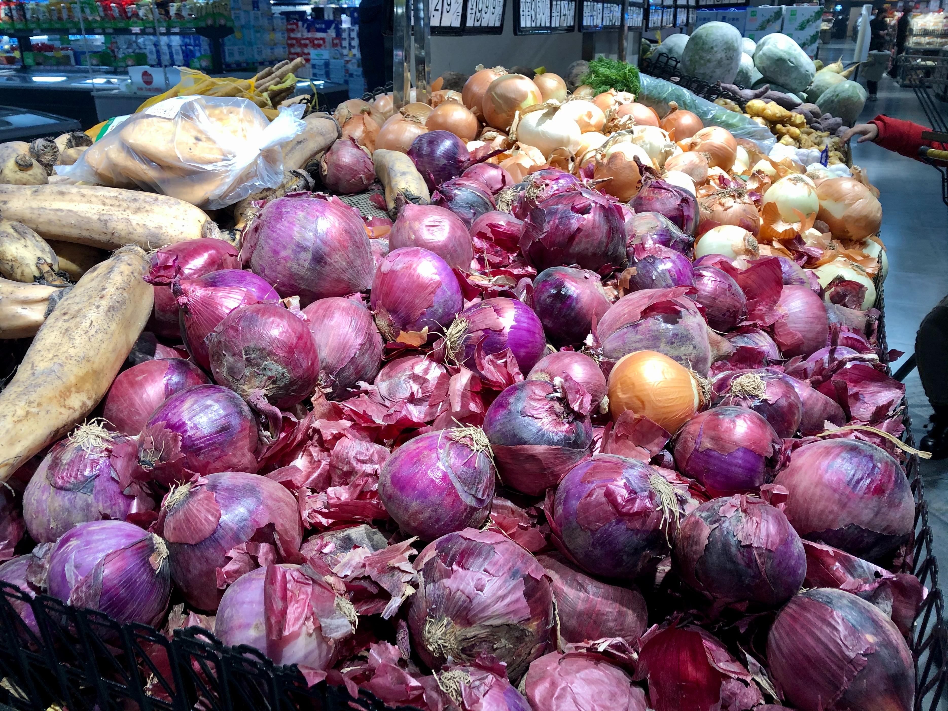 买洋葱怎么买嫩的,洋葱红皮和黄皮哪个好